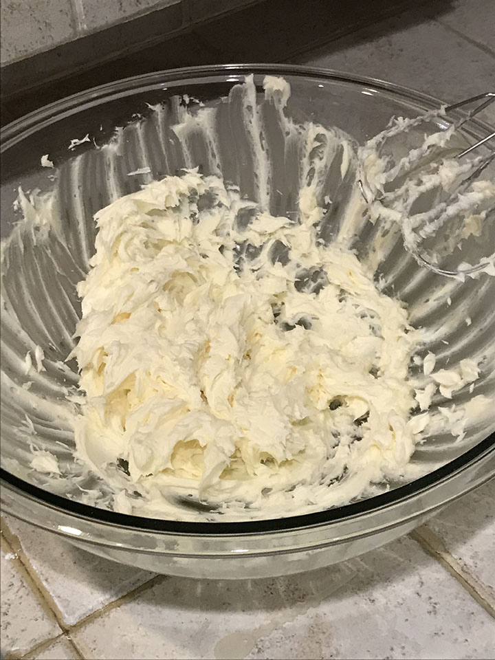 Vanilla buttercream in glass bowl