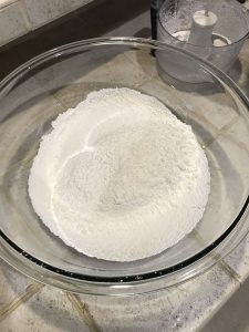 Almond flour and powdered sugar in bowl